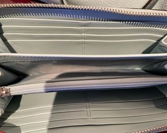 Very nice selection of newer Coach handbags and wallets