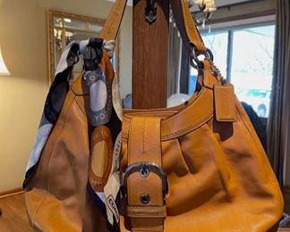 Very nice selection of newer Coach handbags and wallets, including this Large Soho model being sold with the Coach scarf