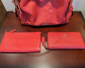 Very nice selection of newer Coach handbags and wallets