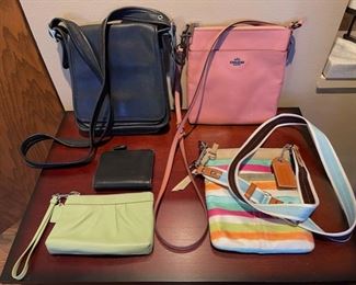 Very nice selection of newer Coach handbags and wallets