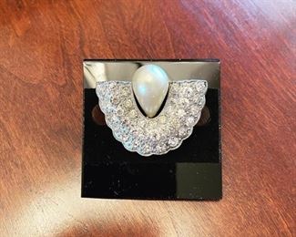 A little vintage RBG even!  This is a brooch!