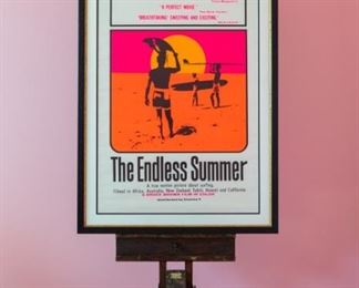 The Endless Summer movie poster. Artwork under mat board is larger than what is visible. Visible artwork measures 24" x 36". Frame measures 30" x 42". The search for the perfect wave. Filmed in Africa, Australia, New Zealand, Tahiti, Hawaii & California.