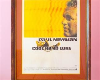 Cool Hand Luke movie poster 1967 starring Paul Newman 67/307.  Tripod reflection in photo. Artwork under mat board is larger than what is visible. Visible artwork measures 27 ¼"x 40 ⅜ ". Frame measures 37 ½  x 40 ¾. Artist for this poster was James Bama, under the art direction of Bill Gold.