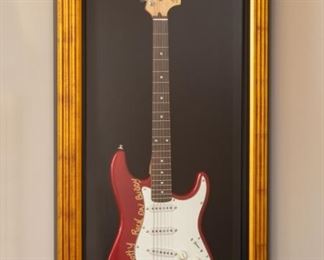 Professionally framed guitar case with Fender Stratocaster guitar signed by Sammy Hagar. . 