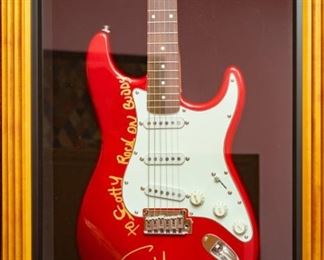 Professionally framed guitar case with Fender Stratocaster guitar signed by Sammy Hagar. . 