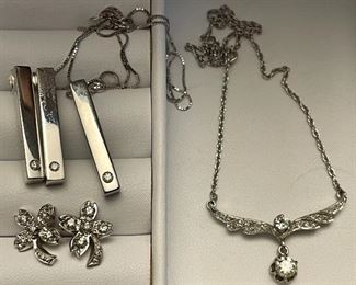 Item 85:  18K White Gold Necklace & Earrings (top left):  $575                                                                                         
Item 86:  14K and Diamond Earrings (bottom left):  $365                                                                                                     Item 87:  14K White Gold & Round Brilliant Diamond (.4)  Necklace (right):  $950
