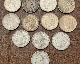 Item 134:  12 Silver Dollars:  $30/Each