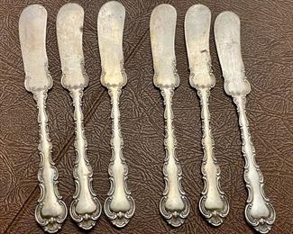 Item 139:  Six Sterling Silver Butter Knives:  $195