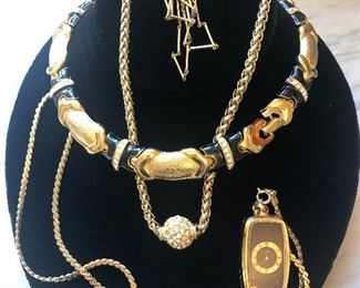 Jewelry #17                                                                                                           Vintage watch on a beautiful link heavy chain  $24.00            Gold tone and black necklace $22.00                                                  Gold tone necklace with glitter ball $18.00                                                                     Vintage Busheer Ball watch on pretty like chain $55.00