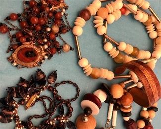 Jewelry Lot #22                                                                                              Lot of 4 vintage necklaces and one wooken cup bracelet $22                                                                    