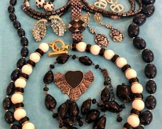 Jewelry #45                                                                                                          Long black beads $10.00                                                                            St John Black and white beads $35.00                                                    Vintage black bead necklace with drop $14.00                             Set of two magnetic necklaces $16.00                                             Rhinestone SUZIO watch $20.00                                                        Rhinestone dangle earrings $12.00                                                      Black and white earrings $12.00............                                                     Marcasite heart $12.00                                                                              Dangle heart earrings $12.00