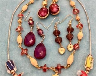 Jewelry #54                                                                                                       Glass and sterling necklace $28.00                                                                   Pink and white necklace $8.00                                                               Purple heart earrings $8.00                                                                       Purple and gold tone earrings $8.00                                                      Purple drop earrings $10.00
