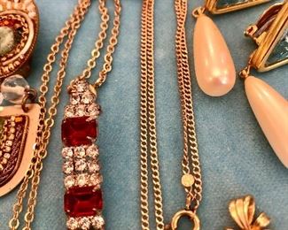Bag 58                                                                                                                    Vintage red stone earrings $10.00                                                        Blue and pearl earrings $8.00                                                                  Blue rhinestone earrings $6.00                                                               Vintage clip rhinestone earrings $6.00                                               Monet chain and cubic zirconia drop $10.00                                      3 stone pendant $6.00