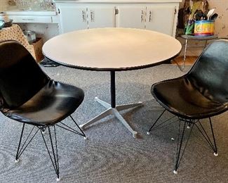 Item 262:  Herman Miller Table and Three Chairs (one chair is broken):                                                                                                                        Table - 42.5" x 28.5" : $200                                                                                       Eames Eiffel Tower Chairs - 18.5"l x 15"w x 32"h: $500                                                 