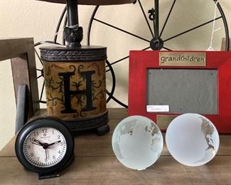 Small "H" lamp; clock; world paper weights; another cute frame