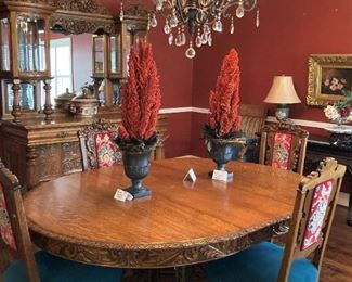 Gorgeous antique table & 4 chairs; 4 more similar antique chairs are available.