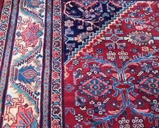 10 feet x 13 feet brilliantly colored rug