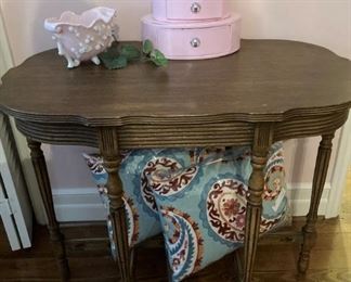 Antique table; decorative pillows