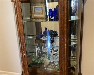 Antique "North Wind" curio cabinet