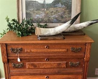Handsome 4-drawer antique chest; decorative horns