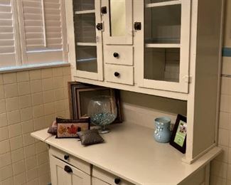 Vintage cabinet in a vintage blue & yellow vintage tile bathroom