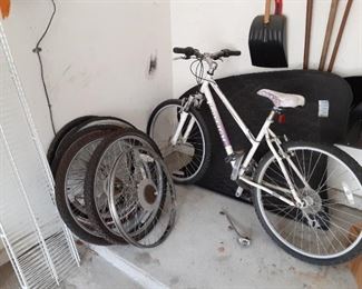 Women's Raleigh bicycle $15 miscellaneous bicycle parts $10 for all the wheels and rims