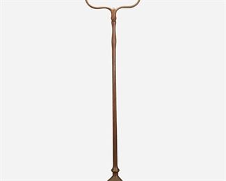 10
A Tiffany Studios Harp Floor Lamp
Circa 1902-1919; New York, NY
Shade signed: L.C.T. / Favrile; Base signed: Tiffany Studios / New York / 423
The green and gold iridescent damascene Favrile glass shade with tones of blue and pink on a single-light patinated bronze harp base with plain stem and pivoting socket raised on three curved legs with spade feet, electrified
Overall: 55" H x 14.25" Dia.; Shade: 10" Dia.
Estimate: $3,000 - $5,000