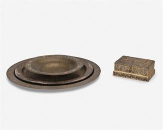 25
Four L.C. Tiffany Gilt-Bronze Table Items
Circa 1902-1928; New York, NY
Three signed: Tiffany Studios / New York; Further marked: 1680 / 1723 / 1747; One signed: Louis C. Tiffany Furnaces, Inc. / [L.C.T. monogram] / 304
Each gilt-bronze, comprising one Tiffany Studios etched border serving tray with stylized floral motif border, one Tiffany Studios "Abalone" card tray with floral border and inset mother-of-pearl discs, one Tiffany Studios "Venetian" cigarette box with cold painted decorations, and one Louis C. Tiffany Furnaces charger with blue and pink enameled geometric border, 4 pieces
Largest: .5" H x 14" Dia.; Smallest: 2.25" H x 5.5" W x 3.875" D
Estimate: $500 - $700