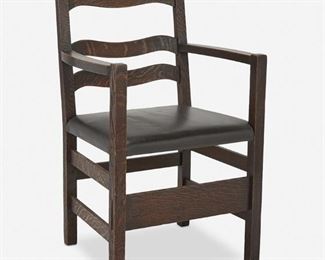 45
A Stickley Brothers Fumed Oak Armchair
First-quarter 20th Century
Appears unsigned
The fumed oak ladder back chair with three shaped back cross rails over a black leather seat atop four square legs joined by a box stretcher
37" H x 23" W x 20" D
Estimate: $200 - $300