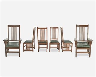 47
Six Contemporary Stickley Oak Chairs
Late 20th/early 21st Century; Manlius, NY
Each with metal tag: Stickley Handcraft Craftsman; Armchairs with Stickley burned mark; Side chairs further marked: 89-384
Each spindle back chair with green leather seat raised on four square legs joined by a through-tenon constructed box stretcher with side spindles, comprising four side chairs with straight top rail and two armchairs with curved top rail and corbeled arms, 6 pieces
Larger: 48.5" H x 27.5" W x 24" D; Smaller: 45.75" H x 19" W x 21" D
Estimate: $1,500 - $2,500