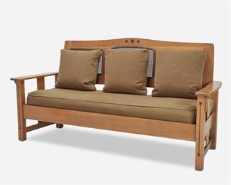 108
A Limbert's Arts And Crafts Ebon-Oak Settee
Circa 1915
Burned mark: Limbert's Arts and Crafts Furniture / Made in Grand Rapids and Holland
The oak settee with caned back and corbeled arms over a green fabric seat raised on four square feet joined by stretchers and finished with geometric ebony inlay to the back and arms
38.5" H x 74" W x 25" D
Estimate: $1,200 - $1,800