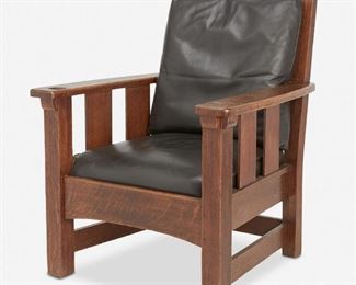 109
A Limbert's Arts And Crafts Oak Armchair, No. 877
First-quarter 20th Century
Burned mark: Limbert's Arts and Crafts Furniture / Made in Grand Rapids and Holland
The original finish oak slat back chair with four back slats over a dark brown leather seat and back cushion with corbeled arms atop four square legs joined by stretchers and an arched seat rail
41" H x 31.75" W x 33" D
Estimate: $1,000 - $1,500