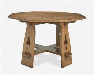 110
A Limbert's Arts And Crafts Oak Table, No. 120
First-quarter 20th Century
Burned mark: Limbert's Arts and Crafts Furniture / Made in Grand Rapids and Holland
The oak table with an octagonal top with corbeled supports atop four slatted legs with cut-out spade motifs joined by an X-strecher with keyed mortise and tenon construction
29" H x 45" Dia.
Estimate: $1,500 - $2,500