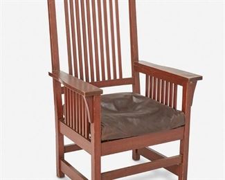 117
An Arts And Crafts-Style Mahogany Armchair
20th Century
In the style of Charles Stickley, the mahogany spindle back chair with ten spindles and corbeled arms with spindle sides over a dark brown leather seat atop four square legs joined by a box stretcher
49" H x 28.75" W x 26" D
Estimate: $700 - $900