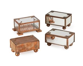 122
Four Mexican Copper Vanity Boxes
Circa 1940s; Taxco, Mexico
Three stamped for Hector Aguilar; One stamped for unknown maker
Comprising three boxes with ball feet designed by Hector Aguilar and one glass-sided box by an unknown maker, 4 pieces
Largest: 2.875" H x 5.125" W x 3.125" D
Estimate: $300 - $500