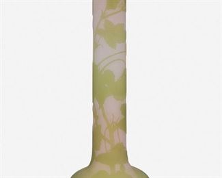 140
A Gallé Cameo Glass Vase
Late 19th/early 20th Century; Nancy, France
Signed: Galle
The acid-etched cameo glass vase with bulbous base and tall cylindrical neck cut from green to pink frost with floral motif
13" H x 4.75" Dia.
Estimate: $500 - $700