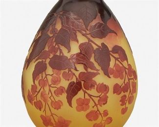 141
A Gallé Cameo Glass "Dogwood" Vase
Late 19th/early 20th Century; Nancy, France
Signed: Galle
The acid-etched cameo glass "Dogwood" vase with bulbous body and flared rim cut from red to yellow frost
8" H x 6" Dia.
Estimate: $500 - $700