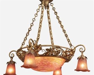 148
An Art Nouveau-Style Gilt-Bronze And Art Glass Chandelier
20th Century
Spuriously signed for Daum Nancy
The mottled pink and orange domical glass shade mounted in a gilt-bronze grapevine motif frame with four light sockets and issuing four scrolled arms terminating in matching floriform glass shades, fitted with four suspended chain link harnesses and canopy, electrified
30" H x 33" Dia.
Estimate: $1,000 - $2,000