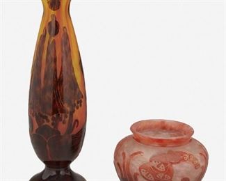 152
Two Charles Schneider Le Verre Français Glass Vases
Circa 1918-1932; Epinay-sur-Seine, France
Each signed: Le Verre Francais; One further signed: Charder
Each acid-etched cameo glass, comprising one footed "Campanules" vase cut from mottled red to red and yellow frost with a tapered body and flared rim and one bulbous "Foxglove" bowl cut from red and pink to pink and white frost, 2 pieces
Larger: 9.375" H x 2.5" Dia.; Smaller: 3" H x 4" Dia.
Estimate: $500 - $700