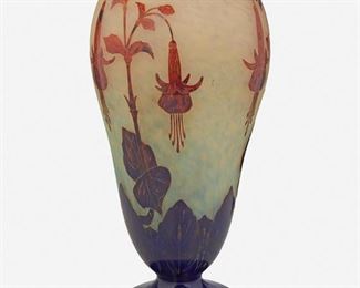 153
A Charles Schneider Le Verre Français Glass "Fuschia" Vase
Circa 1918-1932; Epinay-sur-Seine, France
Signed: Le Verre Francais / France
The acid-etched cameo glass "Fuschia" vase cut from orange and blue to mottled clear and blue frost with pinched neck, flat rim, and flared foot
17.625" H x 7.5" Dia.
Estimate: $800 - $1,200