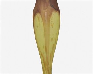 154
A Charles Schneider Art Glass Vase
Circa 1918-1932; Epinay-sur-Seine, France
Signed: Schneider [amphora]
The yellow and purple frosted glass vase with tapering body, flared rim, and stepped foot with engraved signature with traces of gilt
18" H x 4.625" Dia.
Estimate: $400 - $600