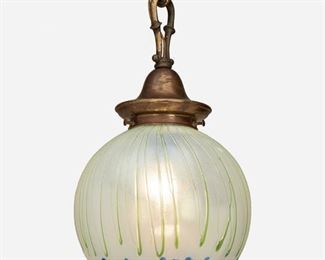 171
A Loetz-Style Art Glass Pendant Chandelier
First-quarter 20th Century
The pendant chandelier with a spherical Loetz-style iridescent glass shade with blue oil spot finish and spun green overlay fitted with a single light socket and brass canopy, scrolled loop, and chain link harness, electrified
Overall: 15" H x 8.75" Dia.
Estimate: $400 - $600