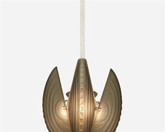174
A Sabino-Style Art Deco Glass Chandelier
20th Century
Metal fixture bears inscription: Sabino / Paris / Made in France
The four-light silvered-metal chandelier with a square column fitted with four frosted smoked glass segments with geometric patterning, electrified
32" H x 13" Dia.
Estimate: $800 - $1,200