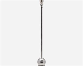 176
An Art Deco Chrome Torchière
Second-quarter 20th Century
Base marked: Rembrandt / R 50 09
The cream-colored glass reflecting shade on a single-light chromed metal base with a plain cylindrical stem atop two joined spheres on a black circular wooden foot, electrified
Overall: 63.25" H x 16" Dia.
Estimate: $800 - $1,200