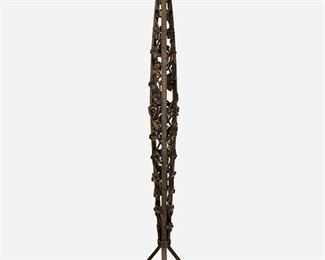 177
An Art Deco Wrought Iron Torchière
Second-quarter 20th Century
In the style of Edgar Brandt, the frosted glass shade with rose border on a three-light tapering wrought iron base with grapevine motif raised on three scrolled feet, electrified
Overall: 69.25" H x 20" Dia.
Estimate: $600 - $800