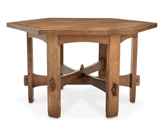 178
A Tom Gardner Arts And Crafts-Style Oak Table
Late 20th/early 21st Century; Pasadena, California
Marked: Gardner Woodcraft / Pasadena
In the style of Stickley No. 410, the oak table with a hexagonal top over an arched apron raised on six slatted legs joined by a stacked three-arm stretcher with faceted finial and keyed mortise and tenon construction
30" H x 47" Dia.
Estimate: $1,500 - $2,500
