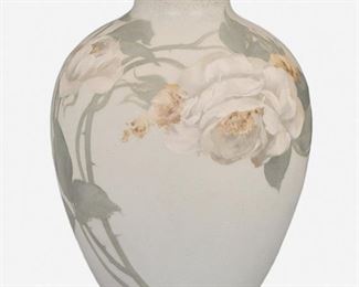 189
A Rookwood Pottery Vase
1905
Marked for Rookwood; Further marked: ED [Edward Diers] / 902 / D / V
Designed by Edward Diers, the flared neck over a bulbous body in matte vellum glaze with slip painted wild rose motif
7" H x 5.5" Dia.
Estimate: $400 - $600