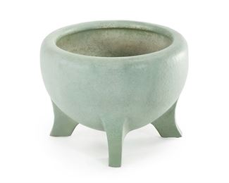 188
A Teco Footed Jardinière Garden Pot
First-quarter 20th Century; Terra Cotta, IL
Impressed: Teco
Designed 1906 by William Day Gates, shape no. 157, the large art pottery jardiniere with matte green glaze raised on four flared feet
15.75" H x 22" Dia.
Estimate: $800 - $1,200