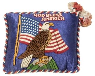 197
A Silk Americana "God Bless America" Pillow
Second-quarter 20th Century
Depicting an embroidered bald eagle and forty-eight star American flag with the phrase "God Bless America" on a blue silk ground finished with a red, white, and blue corded trim and tassels to one corner
18.5" H x 16" W
Estimate: $150 - $250