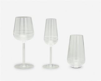 206
A Set Of Baccarat "Athena" Cut Crystal Stemware
Circa 1988-1991
Each signed: Baccarat / France
Each with ribbed stem and cut horizontal linear band to the chalice, comprising four tall water goblets (8.5"), four champagne flutes (8"), and four highball glasses (5.5"), 12 pieces
Estimate: $600 - $900